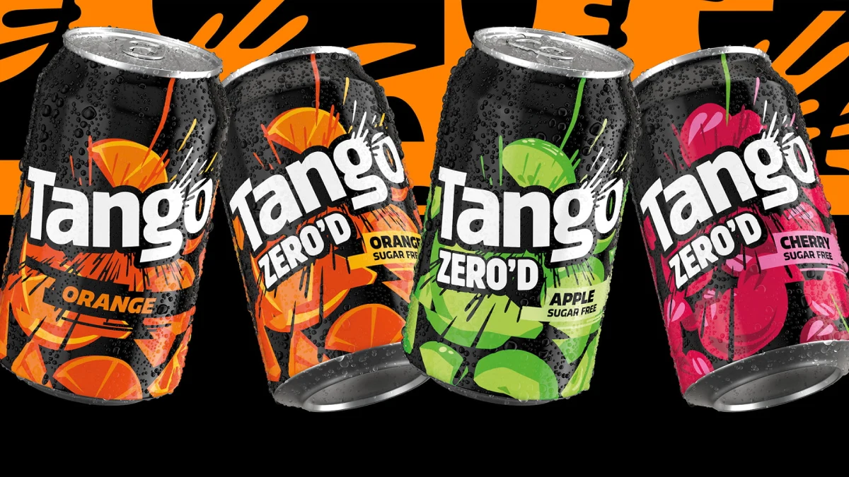 Tango Zero'D Orange, Apple, And Cherry Cans With Bold Fruit Graphics On A Black Background.