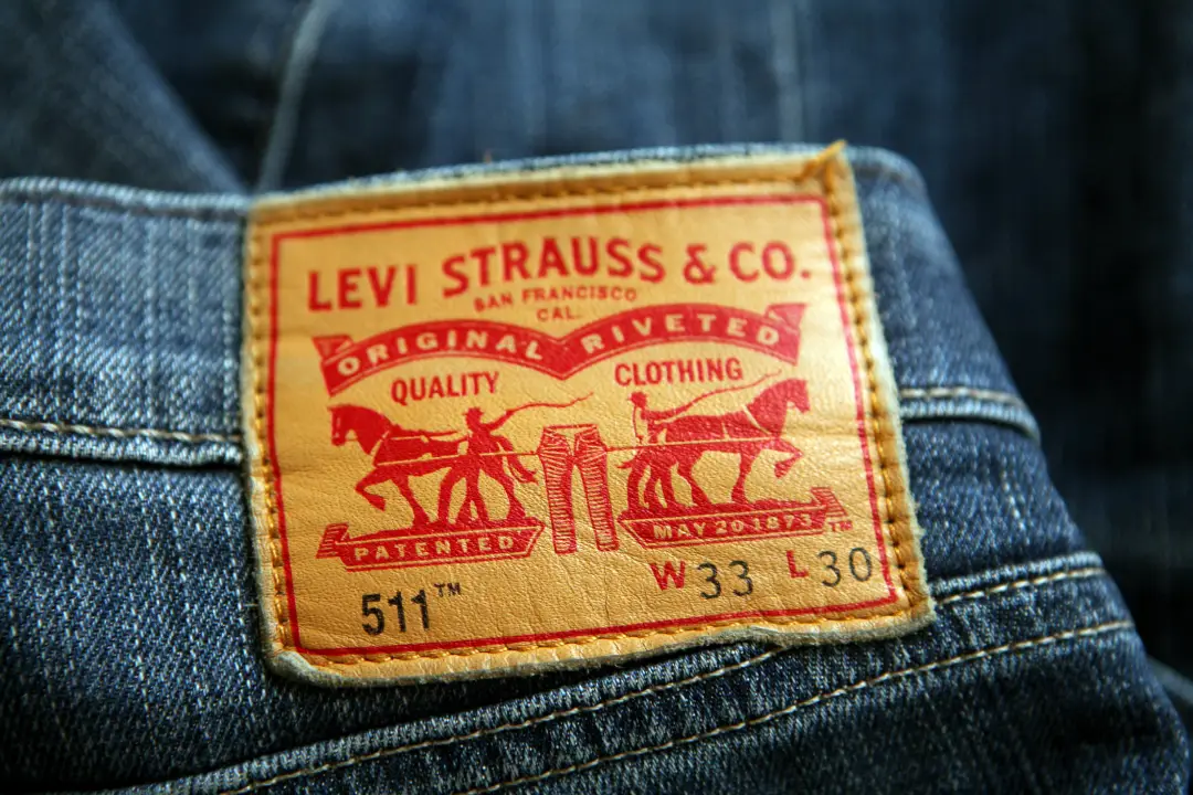 Levi Strauss &Amp; Co. Vintage Denim Patch With Original Riveted, Quality Clothing Lettering On Blue Jeans.